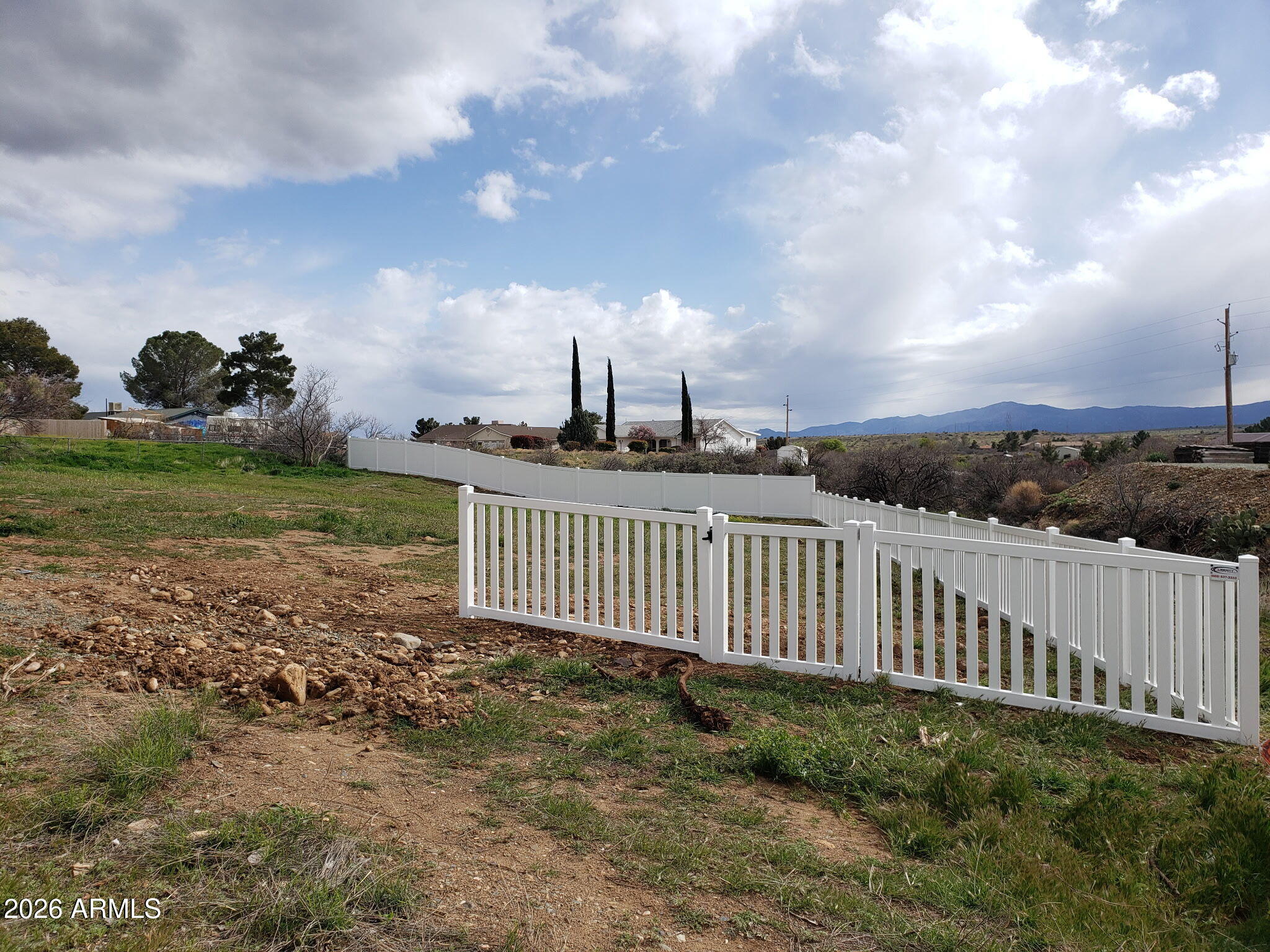 17025 East Spring Valley Road, Unit 821 Mayer, AZ 86333 - Photo 6 of 11 a view of a garden with a pathway