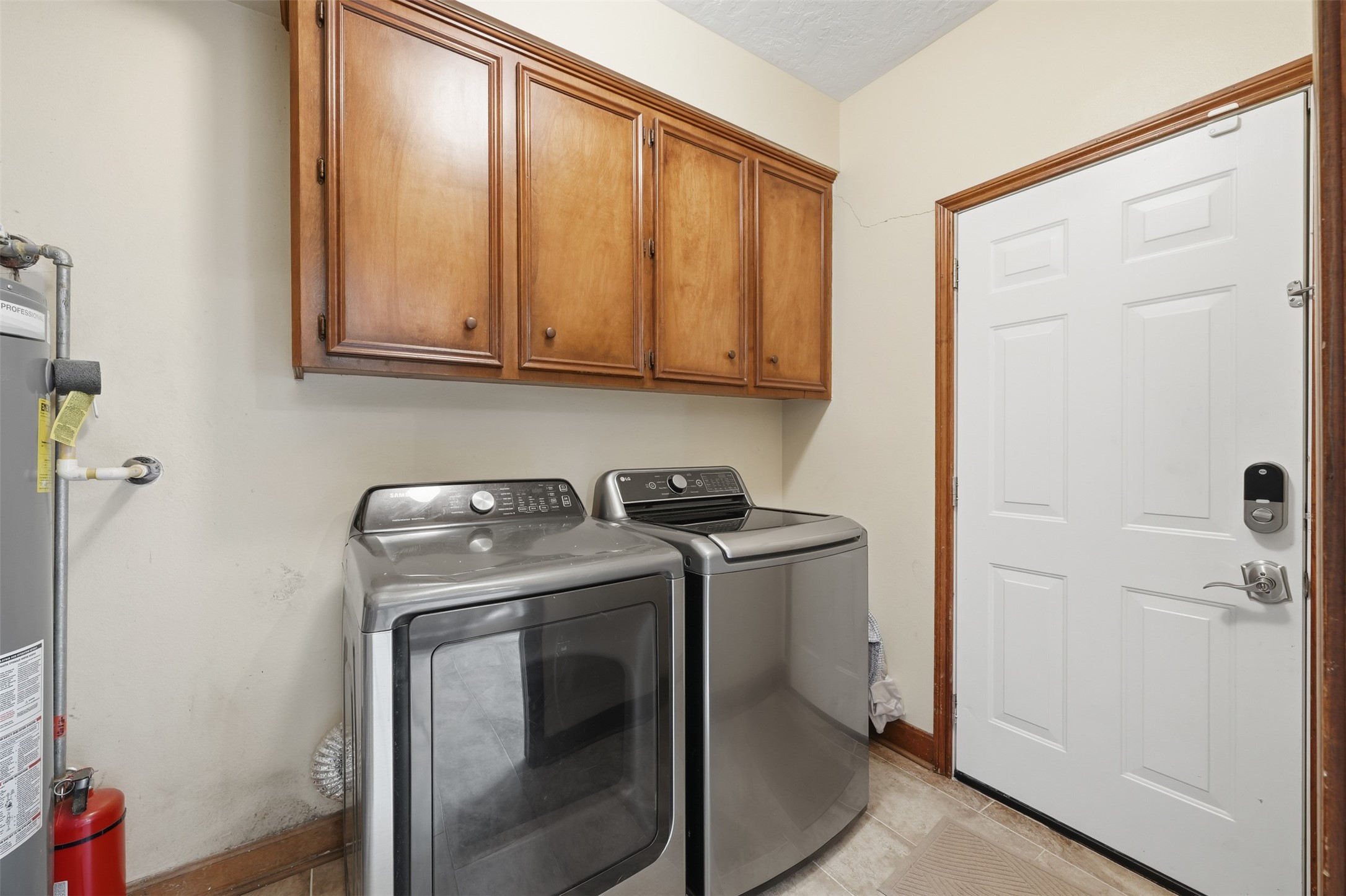 1422 Trace Drive Houston, TX 77077 - Photo 17 of 47 a utility room with dryer and washer