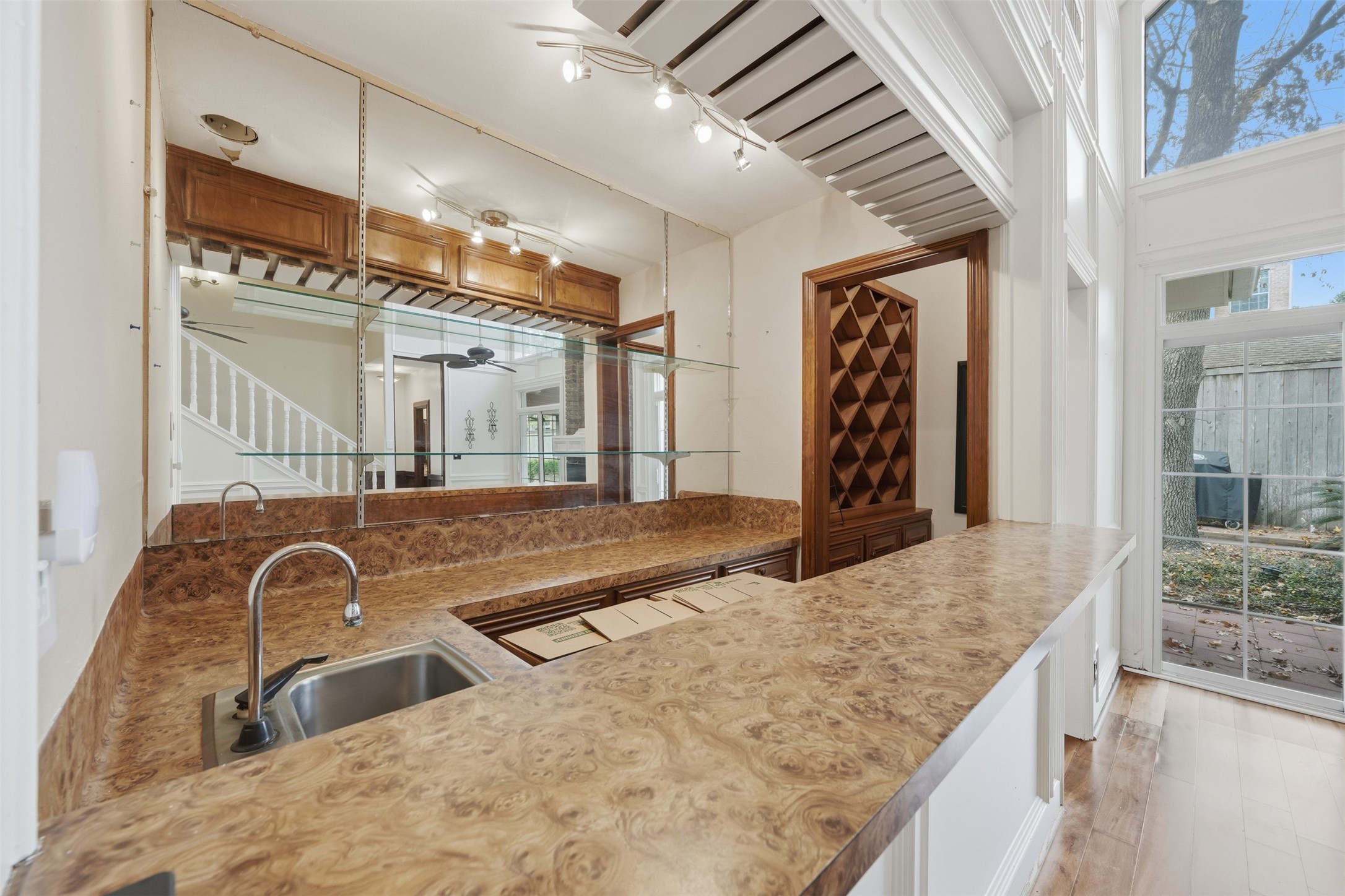 1422 Trace Drive Houston, TX 77077 - Photo 23 of 47 a bathroom with a granite countertop sink and a mirror