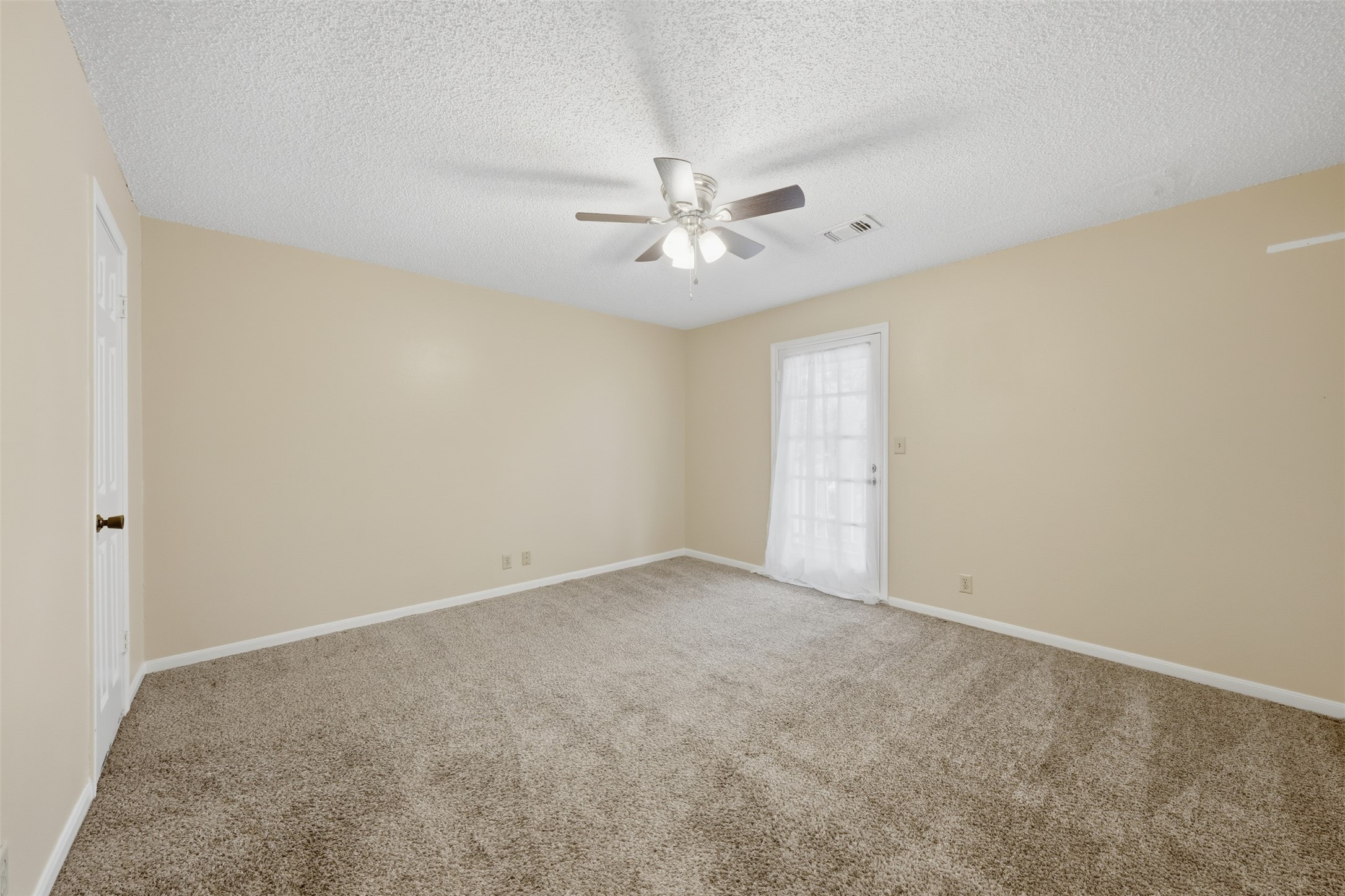 1422 Trace Drive Houston, TX 77077 - Photo 33 of 47 an empty room with windows and fan
