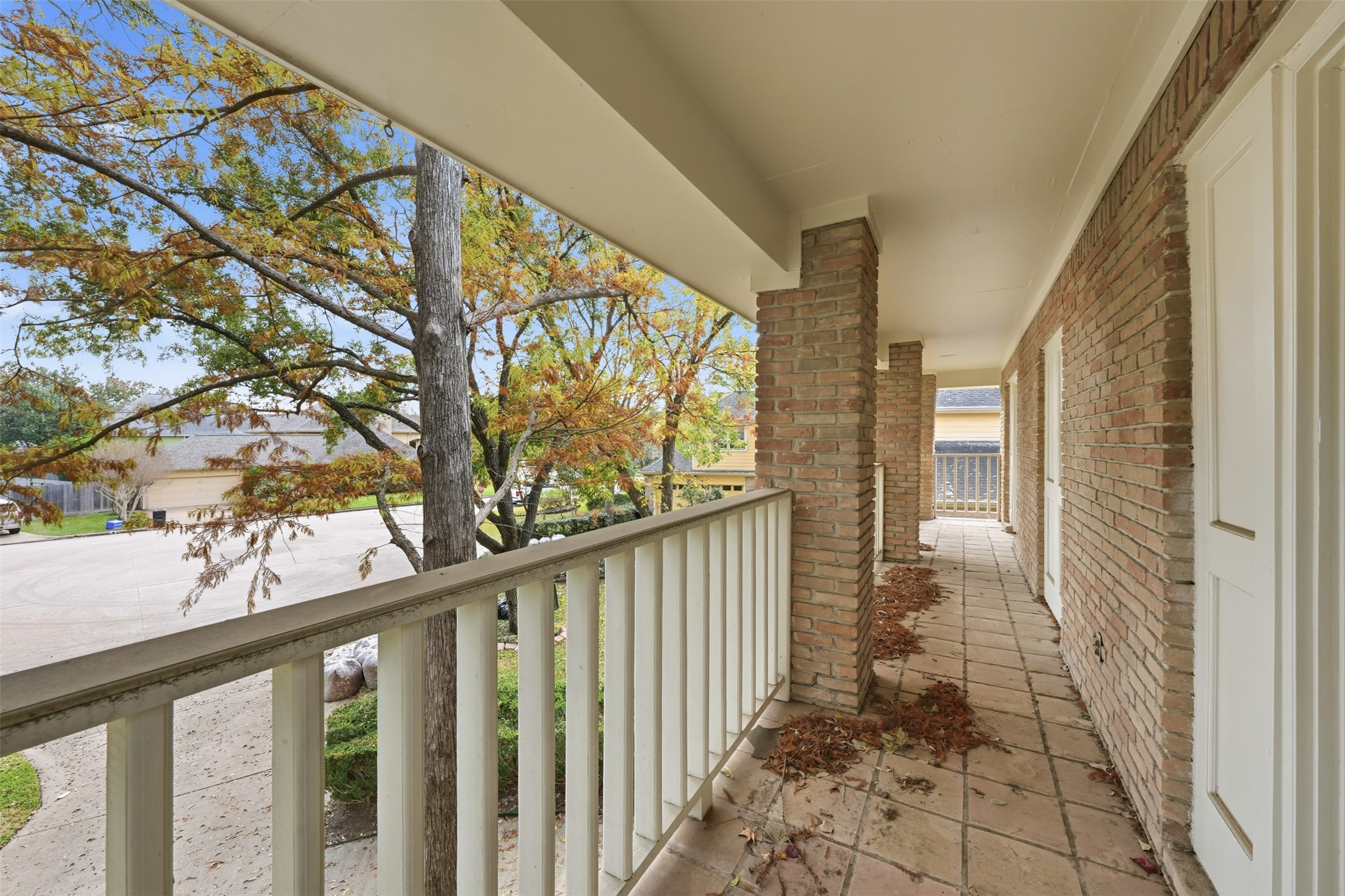 1422 Trace Drive Houston, TX 77077 - Photo 35 of 47 a view of a balcony with wooden floor and fence
