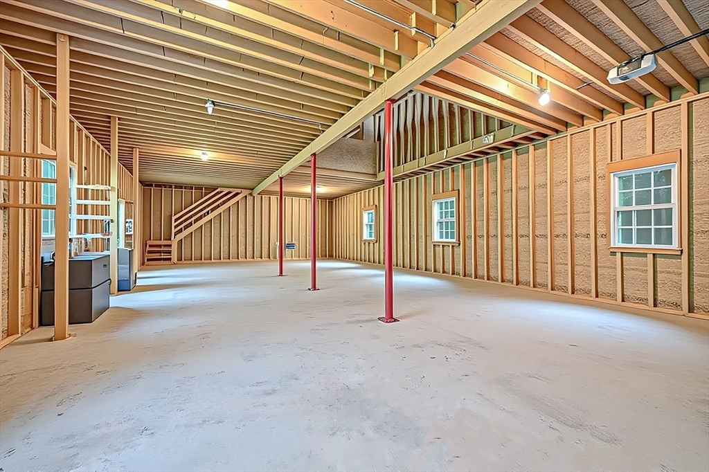 270 Mendon Road Sutton, MA 01590 - Photo 7 of 42 a view of an empty room with a balcony