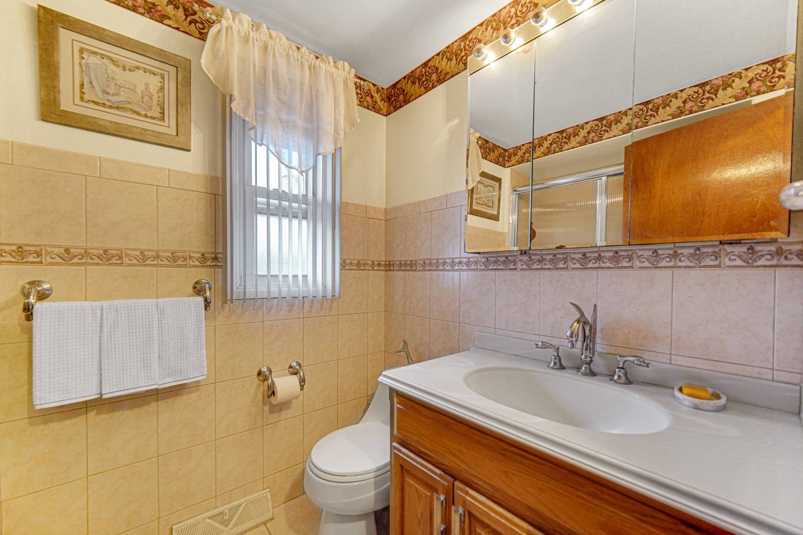 11601 South Ada Street Chicago, IL 60643 - Photo 12 of 20 a bathroom with a sink and a toilet