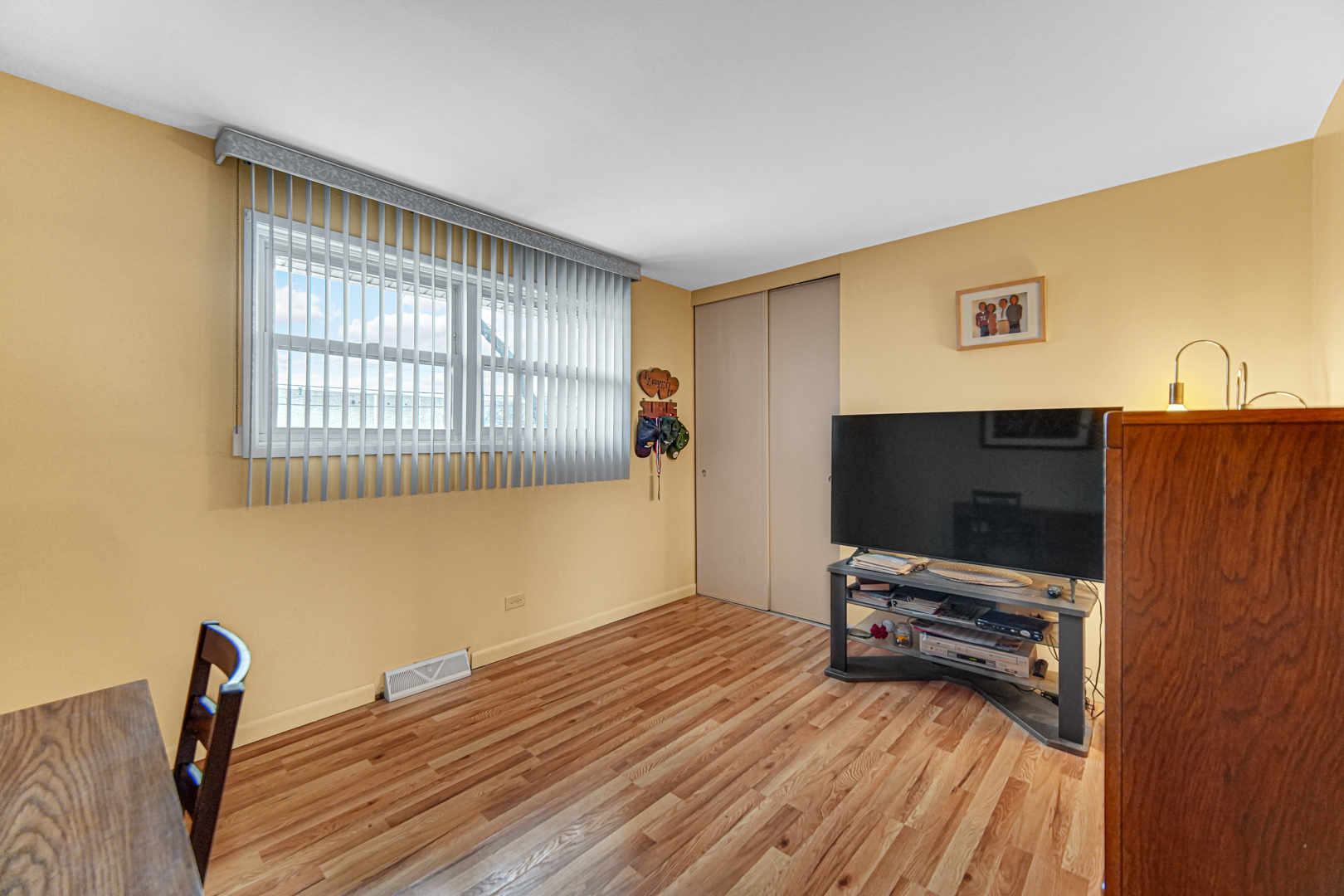 11601 South Ada Street Chicago, IL 60643 - Photo 17 of 20 a bedroom with furniture and a flat screen tv