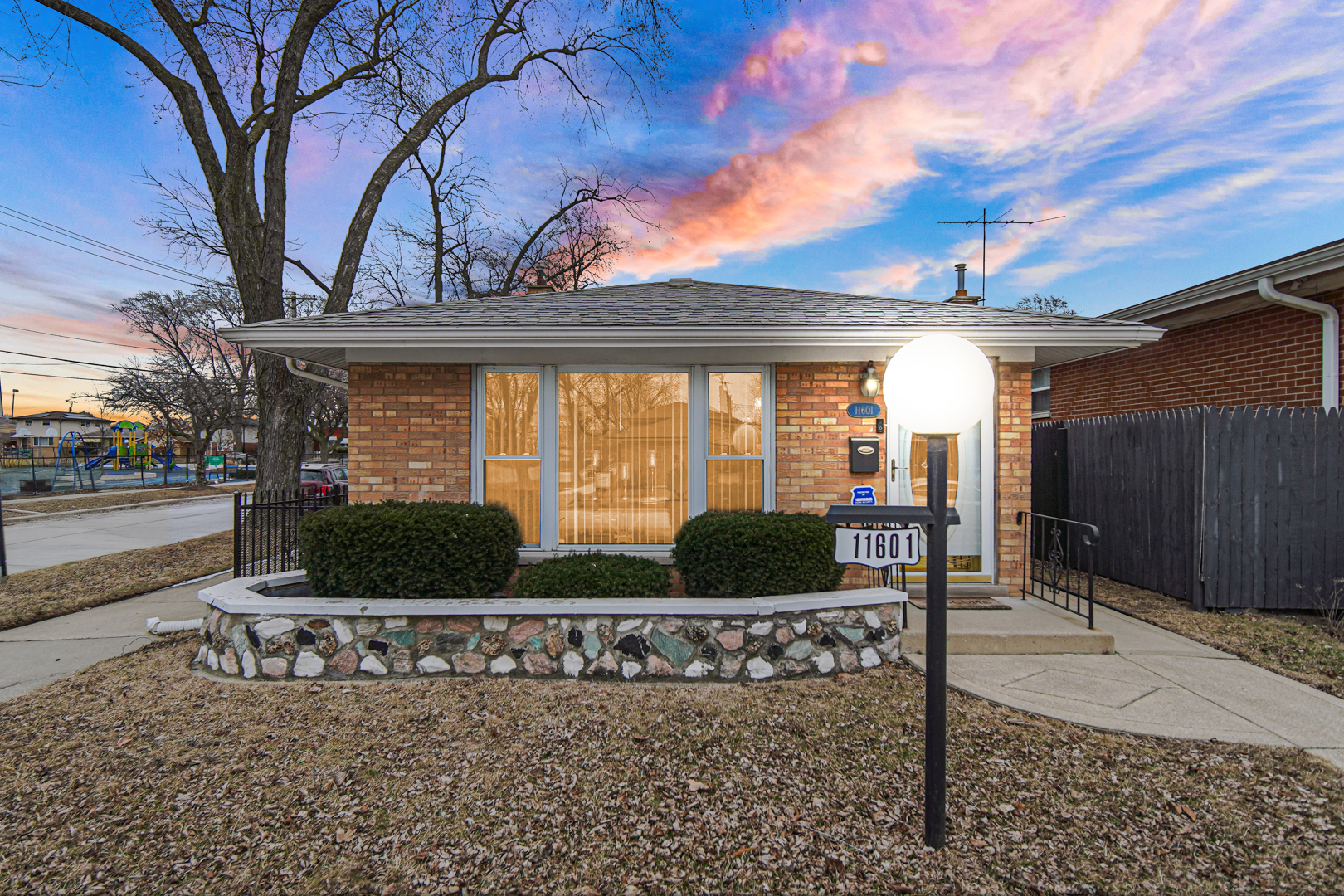 11601 South Ada Street Chicago, IL 60643 - Photo 2 of 20 a front view of a house with garden