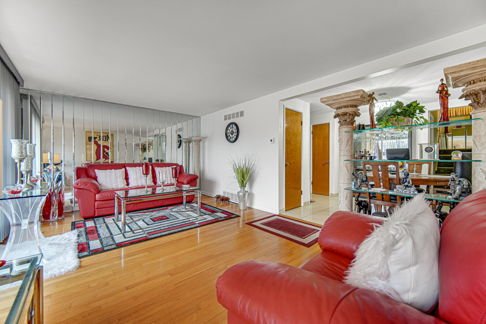 11601 South Ada Street Chicago, IL 60643 - Photo 6 of 20 a living room with furniture a rug and a large window