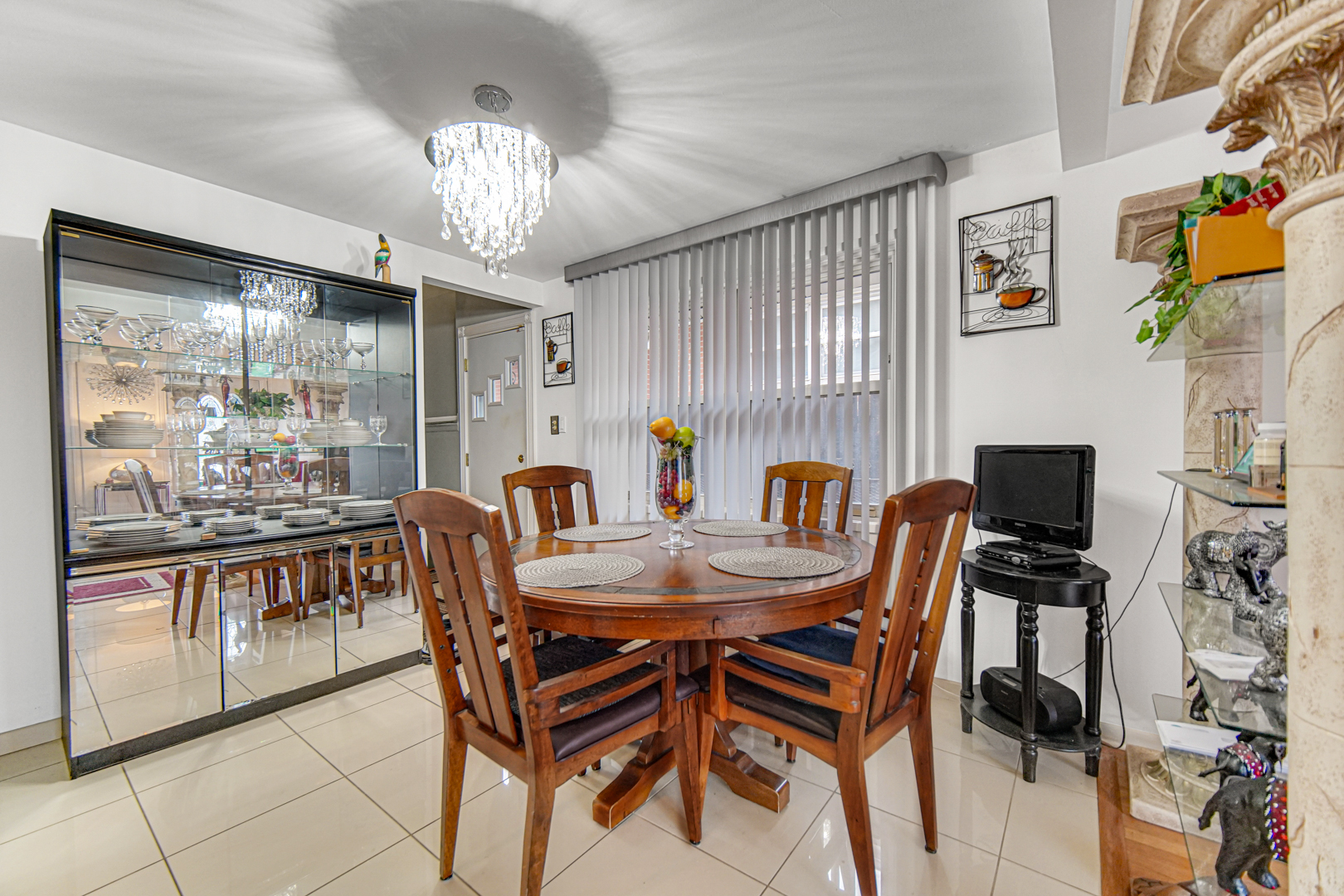 11601 South Ada Street Chicago, IL 60643 - Photo 10 of 20 a dining room with furniture a chandelier and window