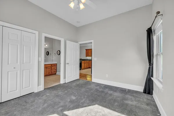 an aerial view of lake residential houses with outdoor space and swimming pool