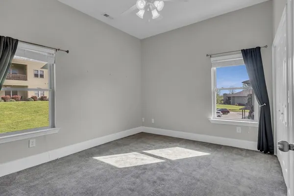 a view of swimming pool from a balcony