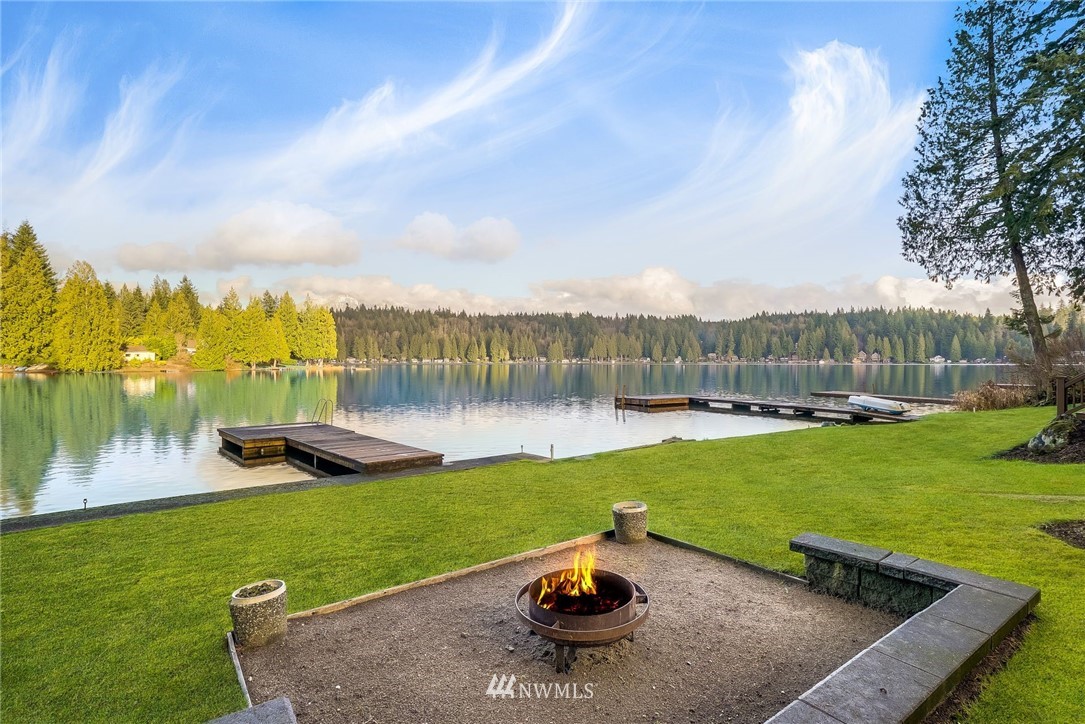 319 West Shore Loop Road Snohomish, WA 98290 - Photo 2 of 32 a view of a lake with a big yard