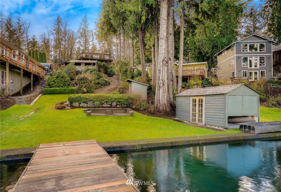 319 West Shore Loop Road Snohomish, WA 98290 - Photo 12 of 32 a view of a house with pool yard and sitting area