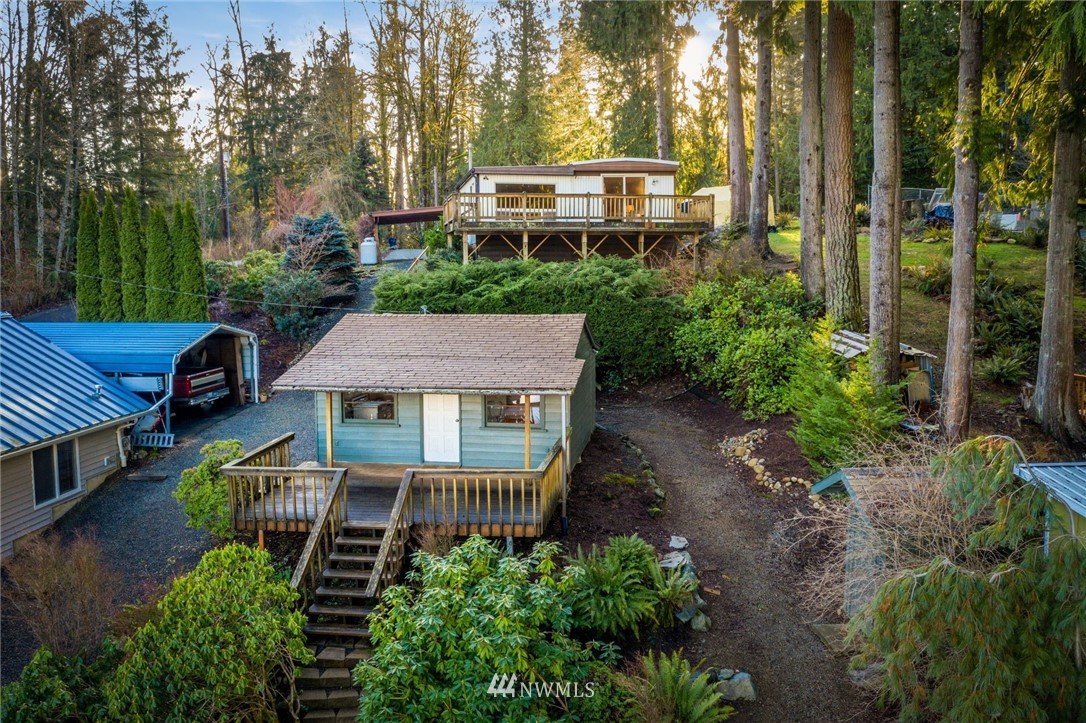319 West Shore Loop Road Snohomish, WA 98290 - Photo 25 of 32 a aerial view of a house with a yard and potted plants