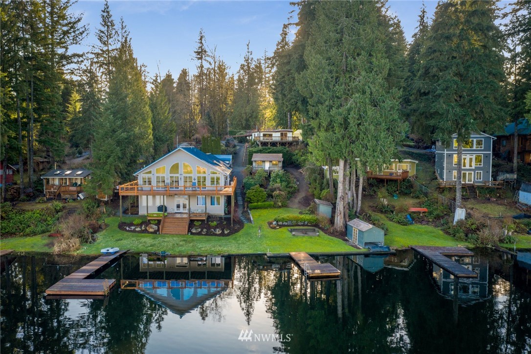 319 West Shore Loop Road Snohomish, WA 98290 - Photo 30 of 32 a aerial view of a house with swimming pool and green space