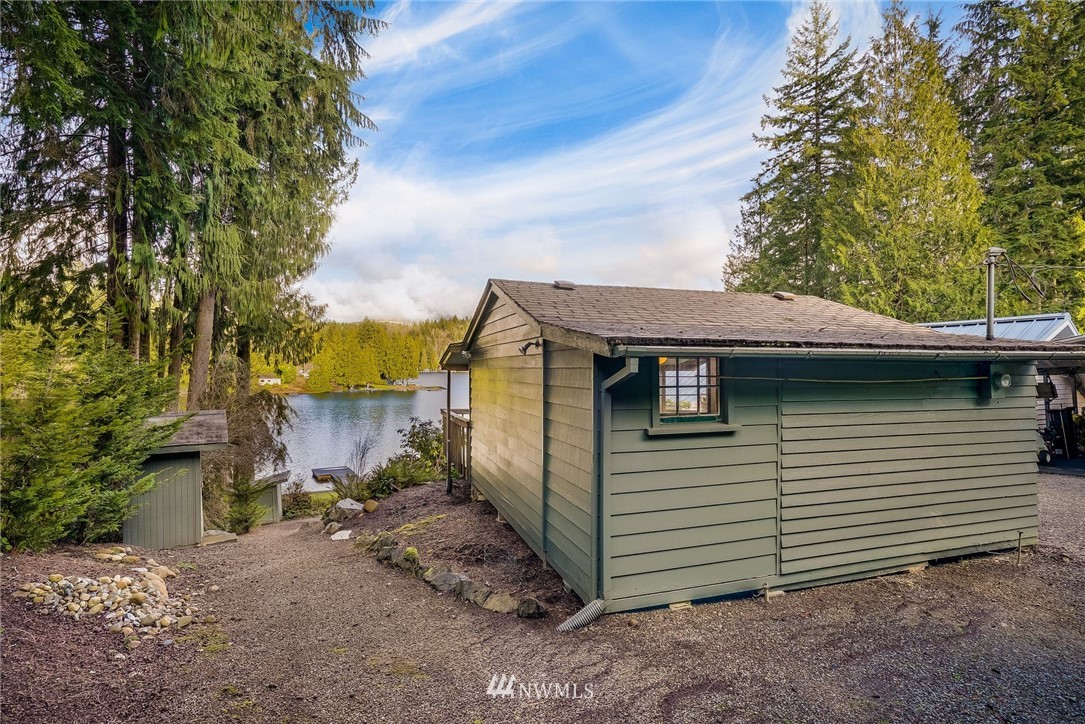 319 West Shore Loop Road Snohomish, WA 98290 - Photo 4 of 32 a view of a house with a yard