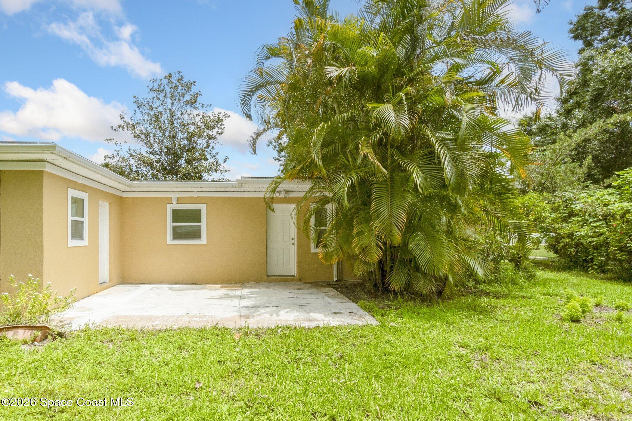 175 Northwest Valencia Road Melbourne, FL 32904 - Photo 23 of 24 Back of Home