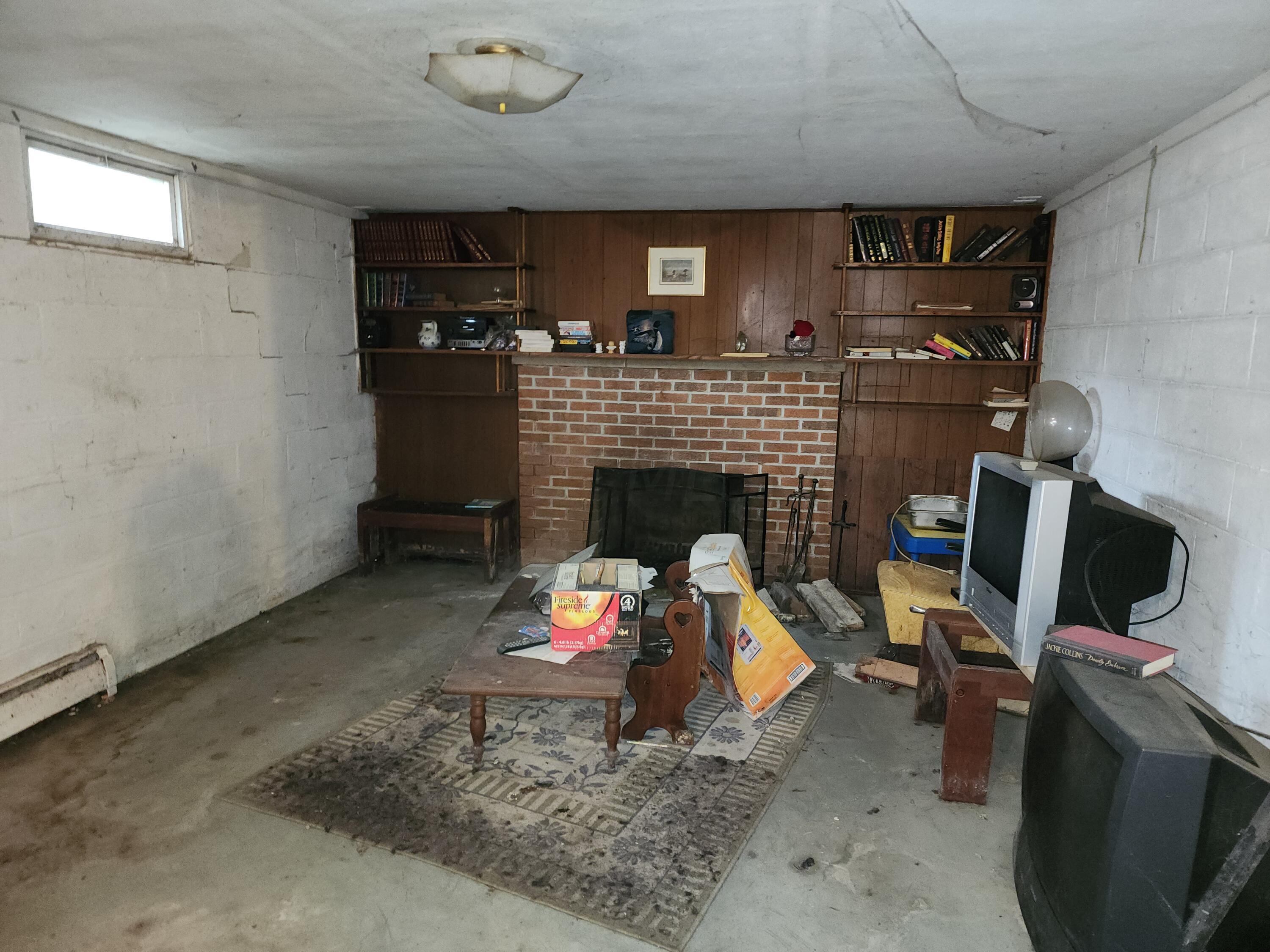 3908 South Section Line Road Delaware, OH 43015 - Photo 45 of 56 Brick Fireplace in Basement