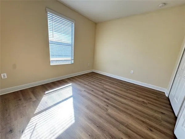 a view of entryway with wooden floor