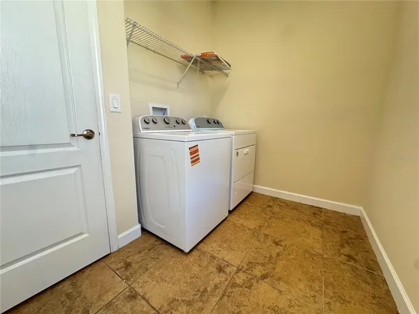 a utility room with a washer and dryer