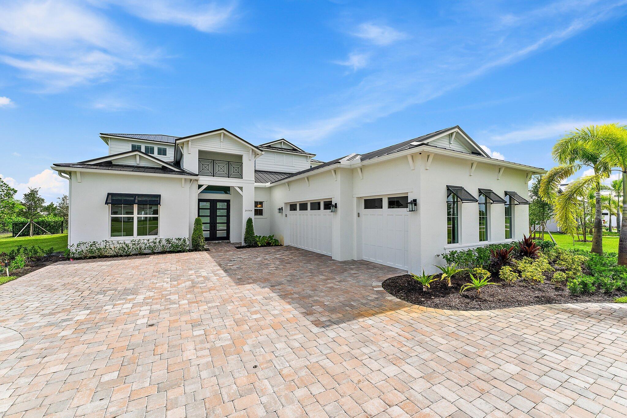 20084 Southeast Bridgewater Drive Jupiter, FL 33458 - Photo 1 of 59 008-20084SEBridgewaterDr-Jupiter-SMALL