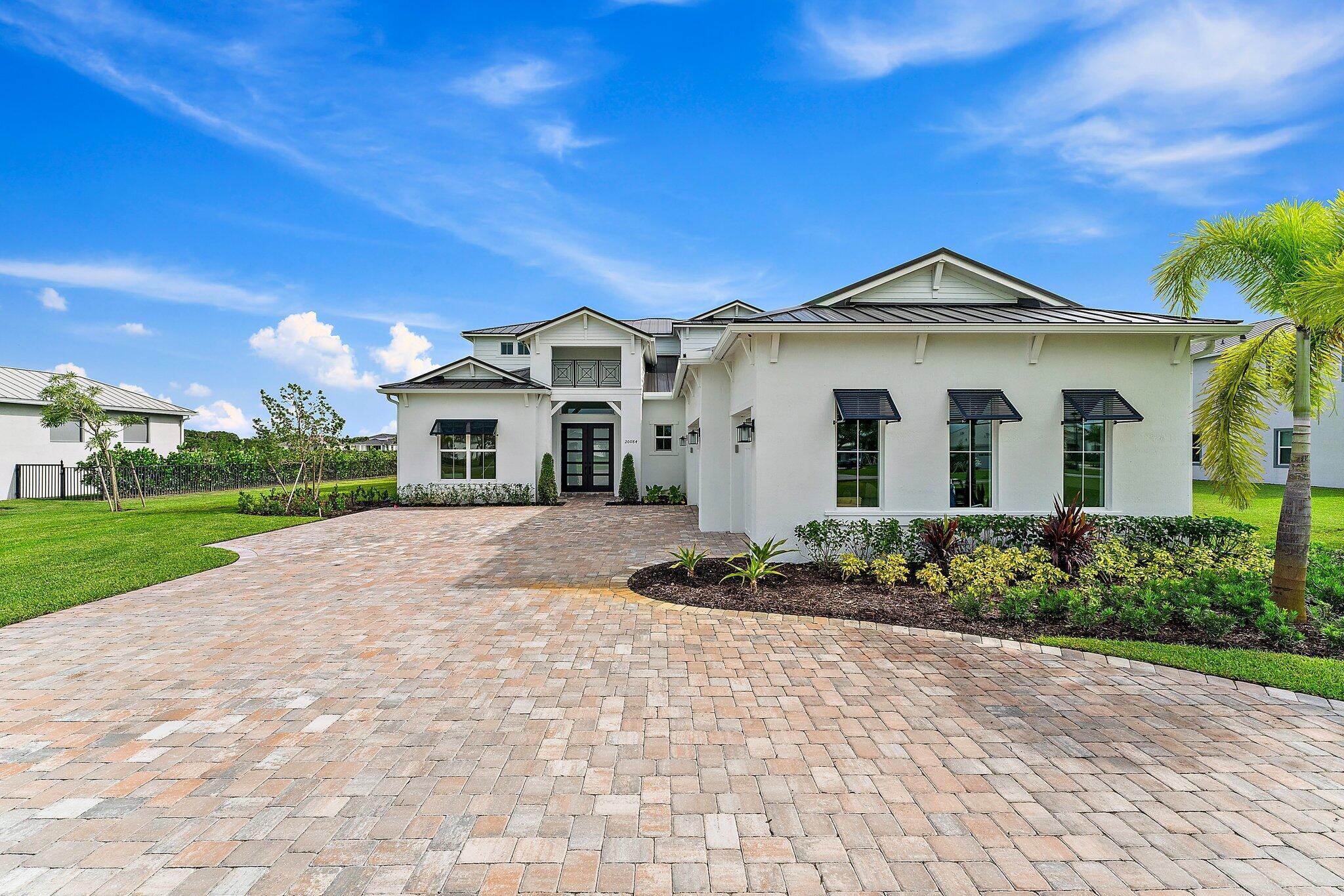 20084 Southeast Bridgewater Drive Jupiter, FL 33458 - Photo 2 of 59 005-20084SEBridgewaterDr-Jupiter-SMALL