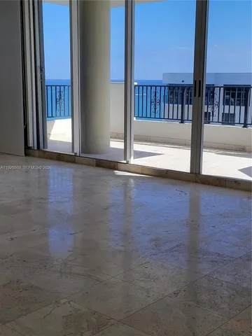 a view of porch with wooden floor