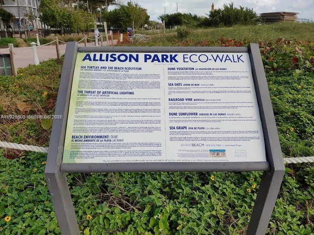 a view of a park with swings and slides