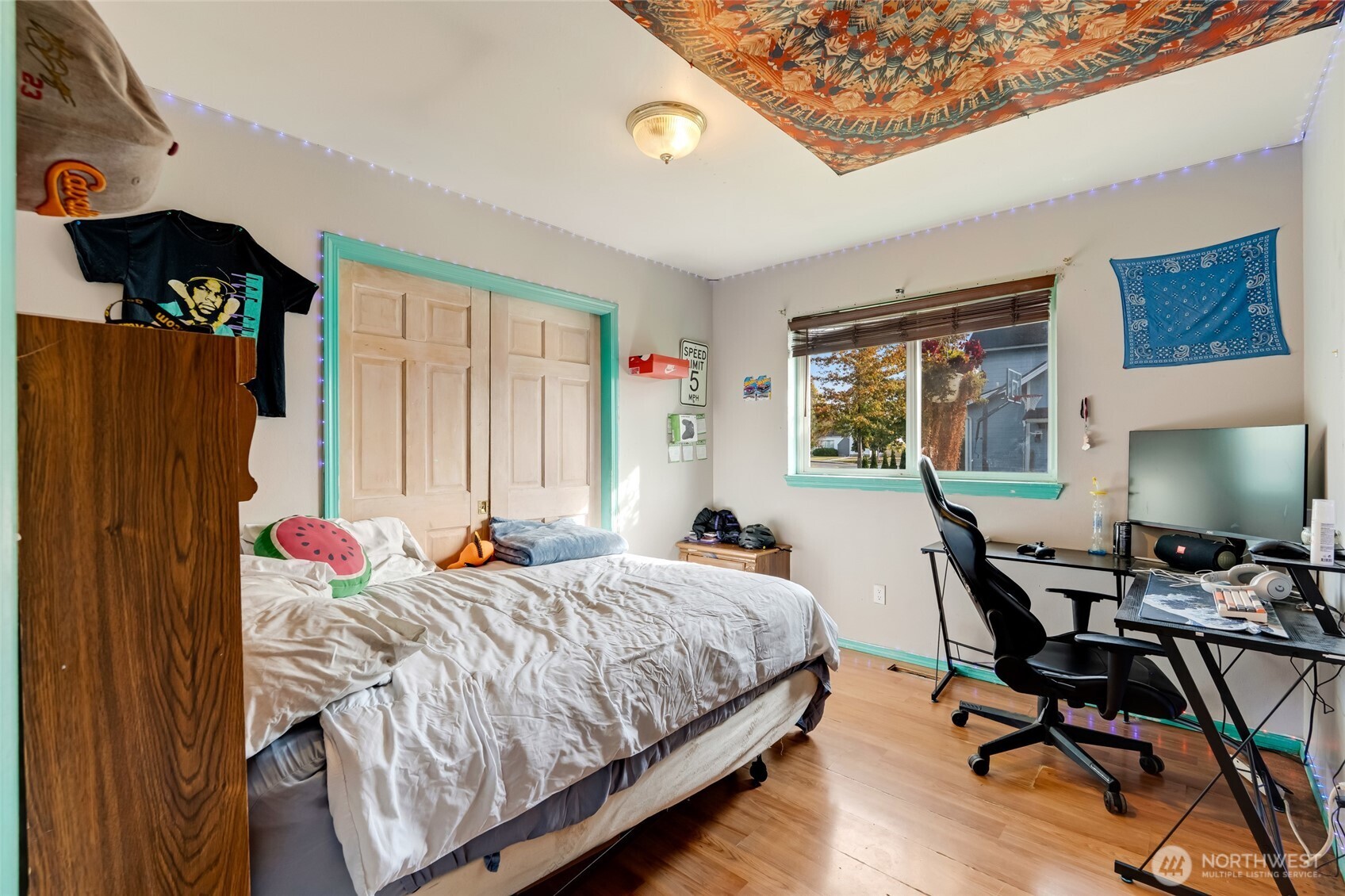 319 6th Street Blaine, WA 98230 - Photo 11 of 24 a bedroom with a bed and a window