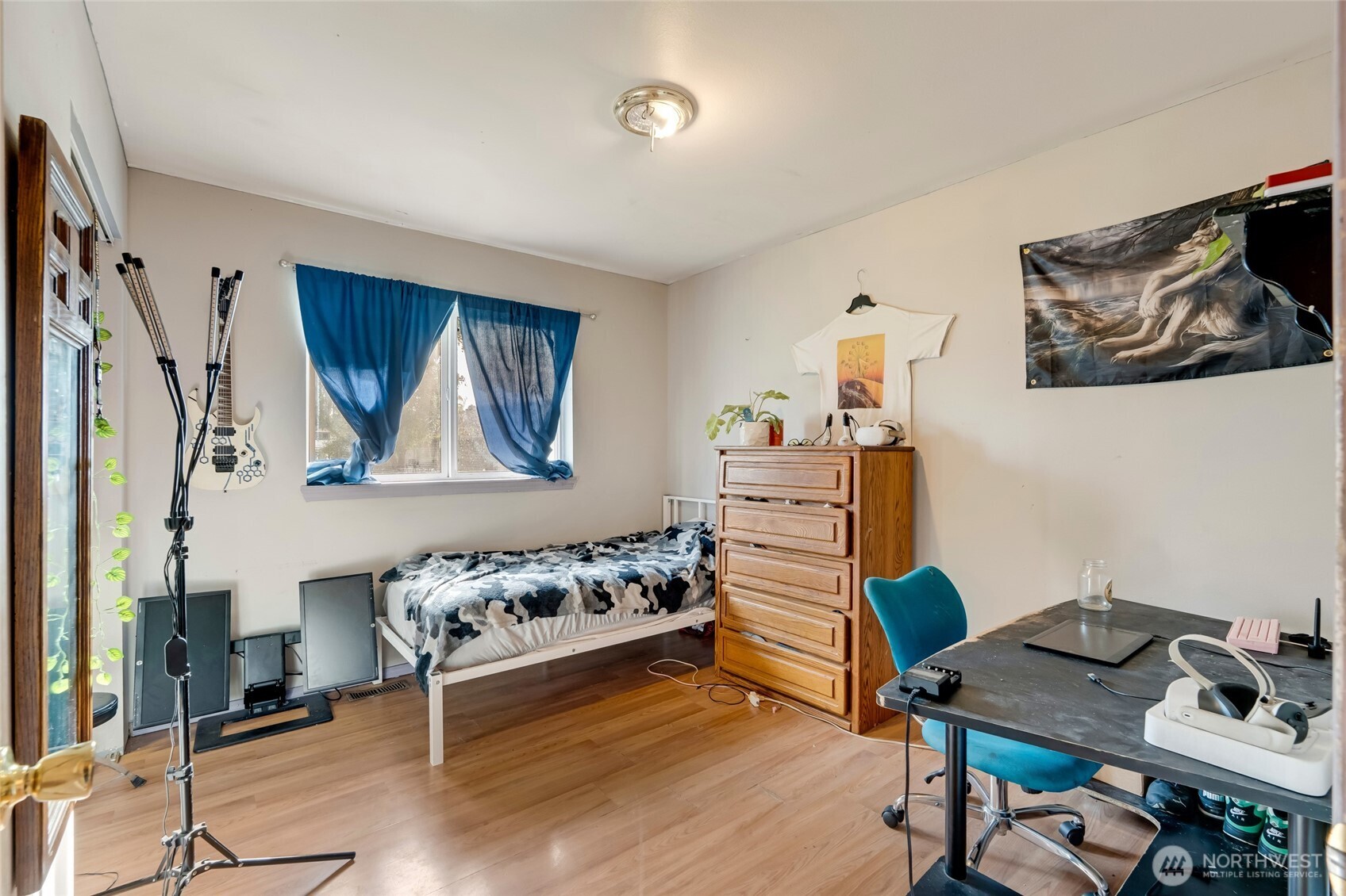 319 6th Street Blaine, WA 98230 - Photo 12 of 24 a bedroom with a bed and a desk