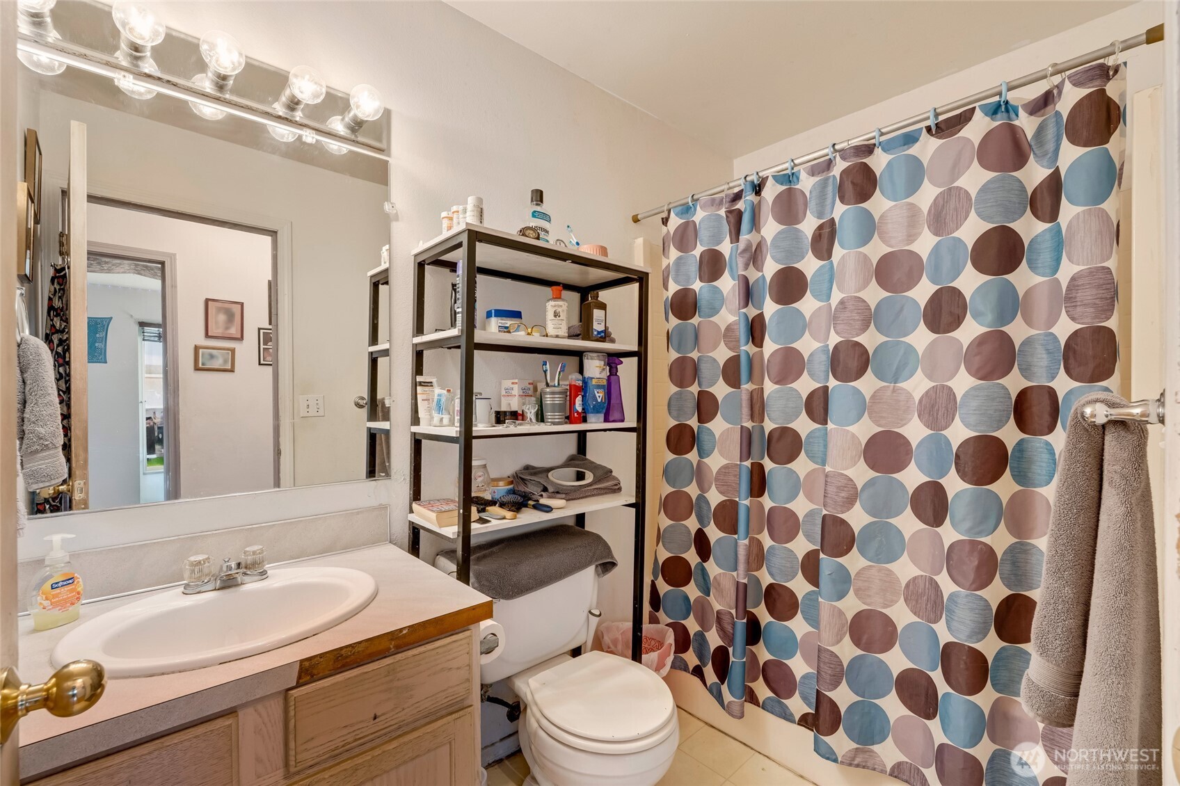 319 6th Street Blaine, WA 98230 - Photo 13 of 24 a bathroom with a sink toilet and shower