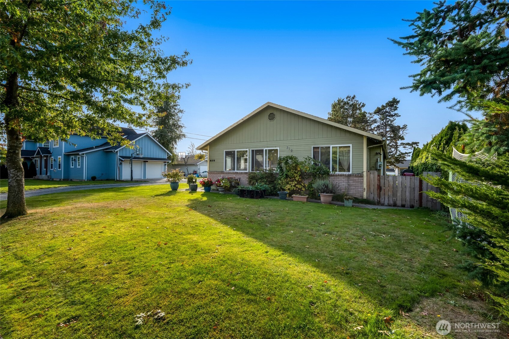 319 6th Street Blaine, WA 98230 - Photo 22 of 24 a front view of a house with yard and green space