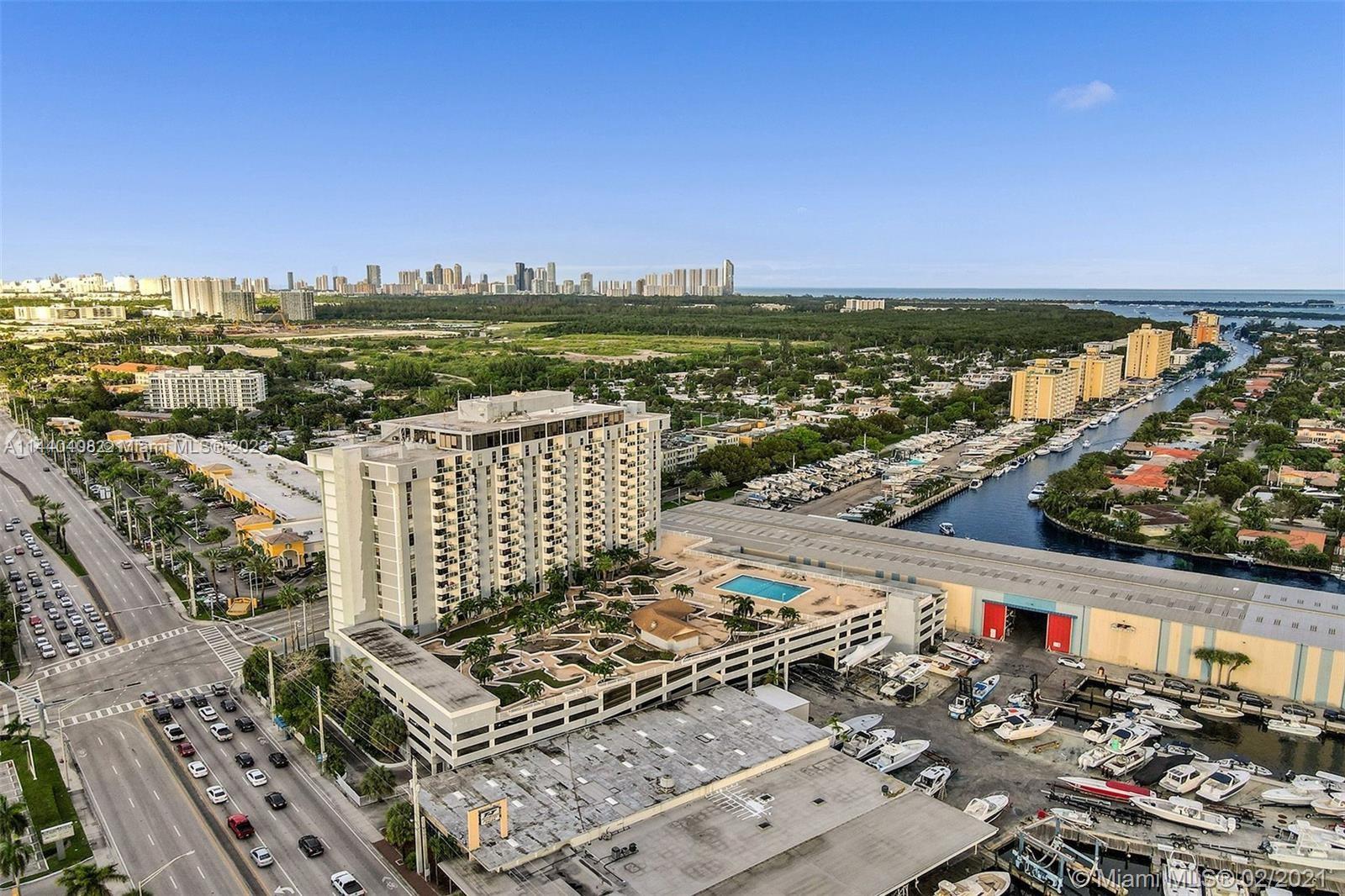 13499 Biscayne Boulevard, Unit 1408 North Miami, FL 33181 - Photo 1 of 24 a view of a city and ocean view