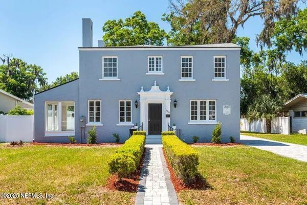a view of a pathway with a yard