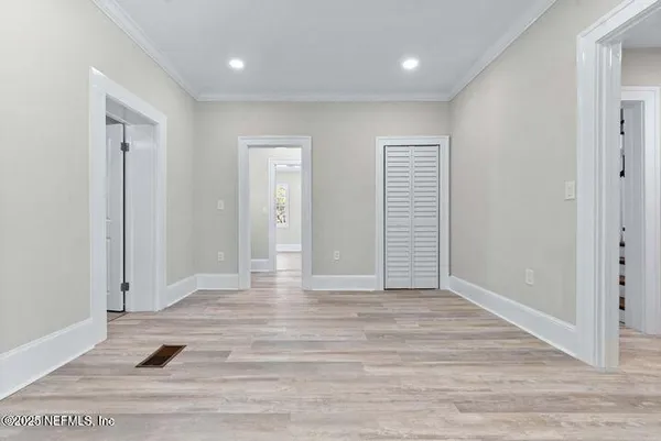 a kitchen with stainless steel appliances granite countertop a sink and cabinets