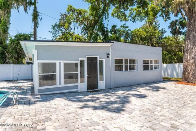a kitchen with a refrigerator stove and sink