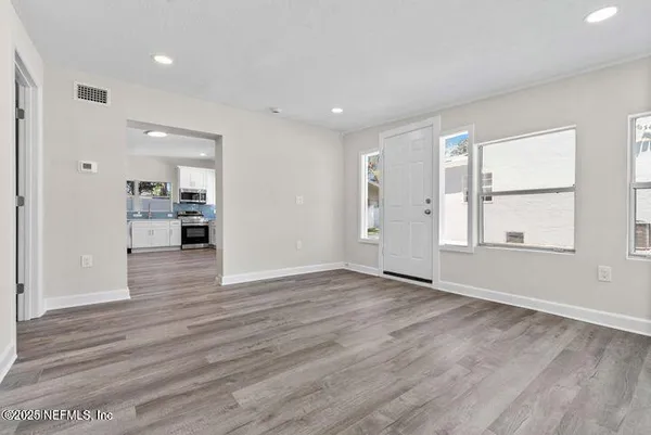 a bathroom with a toilet sink and shower