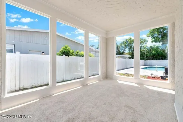 wooden floor fireplace and natural light in a room
