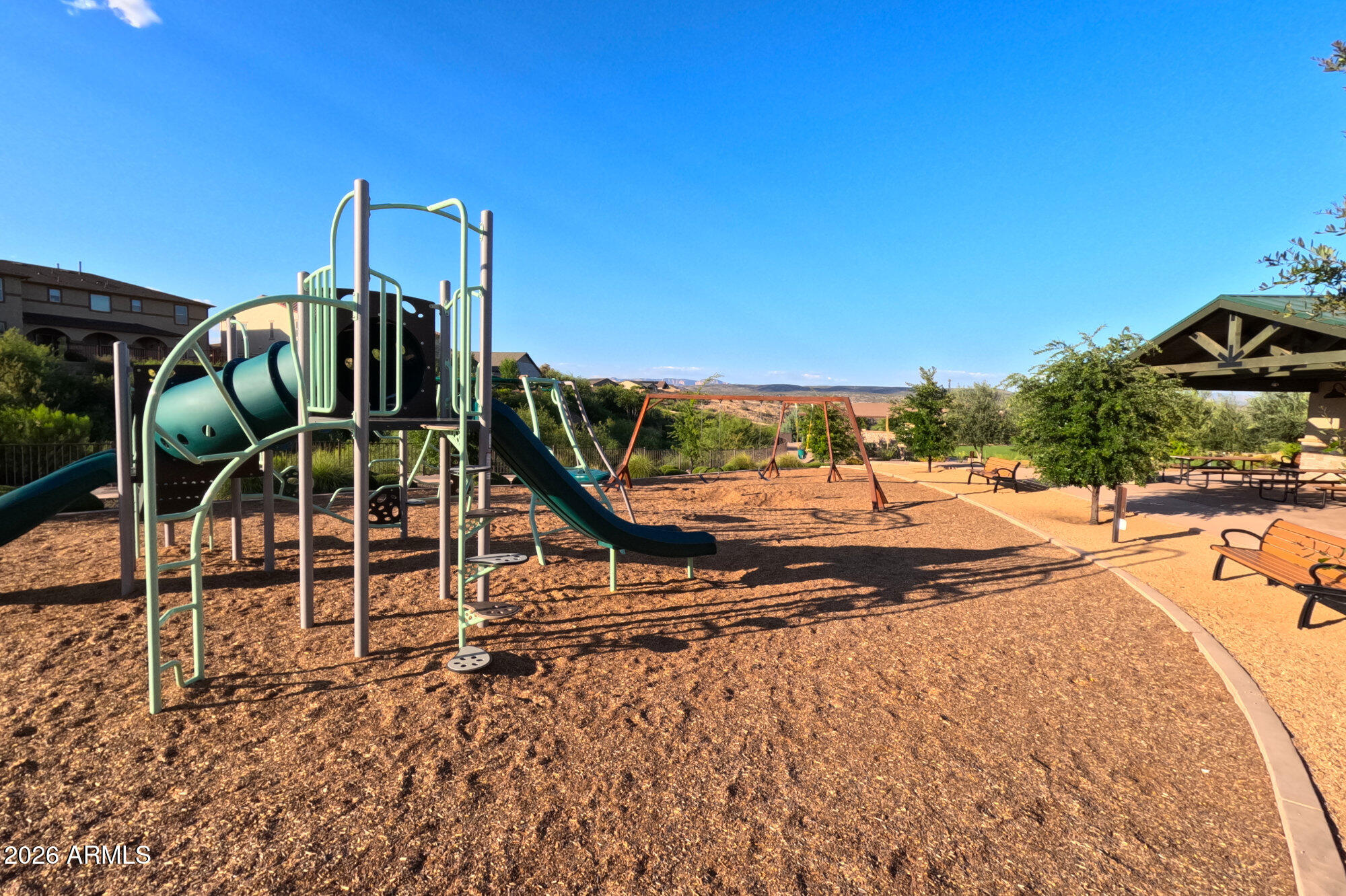 576 Whistle Stop Road Clarkdale, AZ 86324 - Photo 42 of 50 a view of a swimming pool with a patio