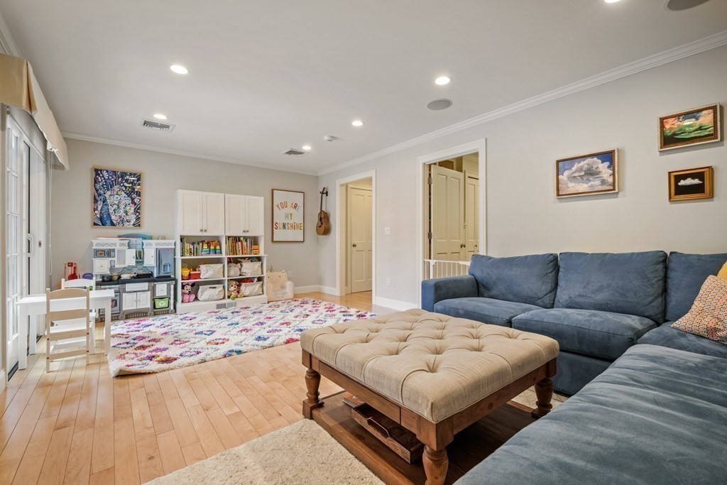 8 Eastham Road Newton, MA 02459 - Photo 18 of 30 a living room with furniture and a table