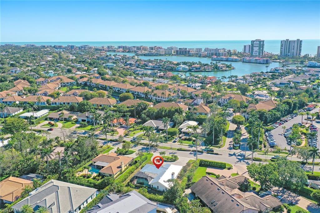 601 Park Shore Drive Naples, FL 34103 - Photo 16 of 18 an aerial view of a city with lots of residential buildings
