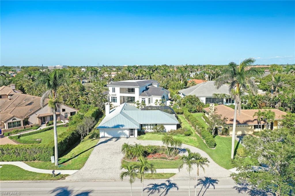 601 Park Shore Drive Naples, FL 34103 - Photo 2 of 18 an aerial view of a house with a garden