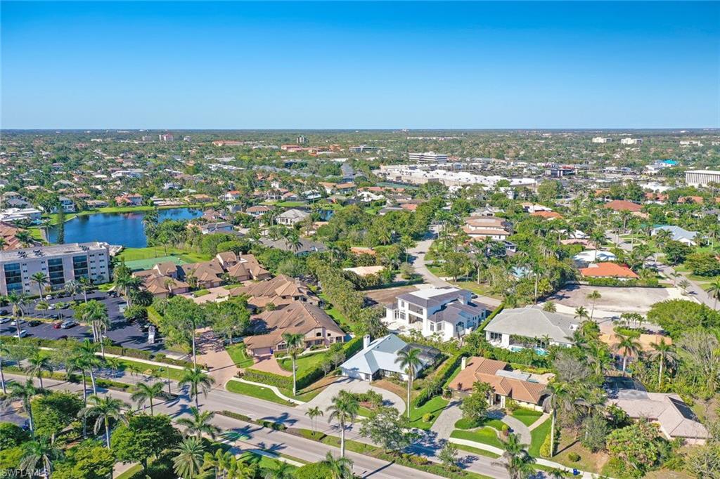 601 Park Shore Drive Naples, FL 34103 - Photo 9 of 18 an aerial view of a city with lots of residential buildings
