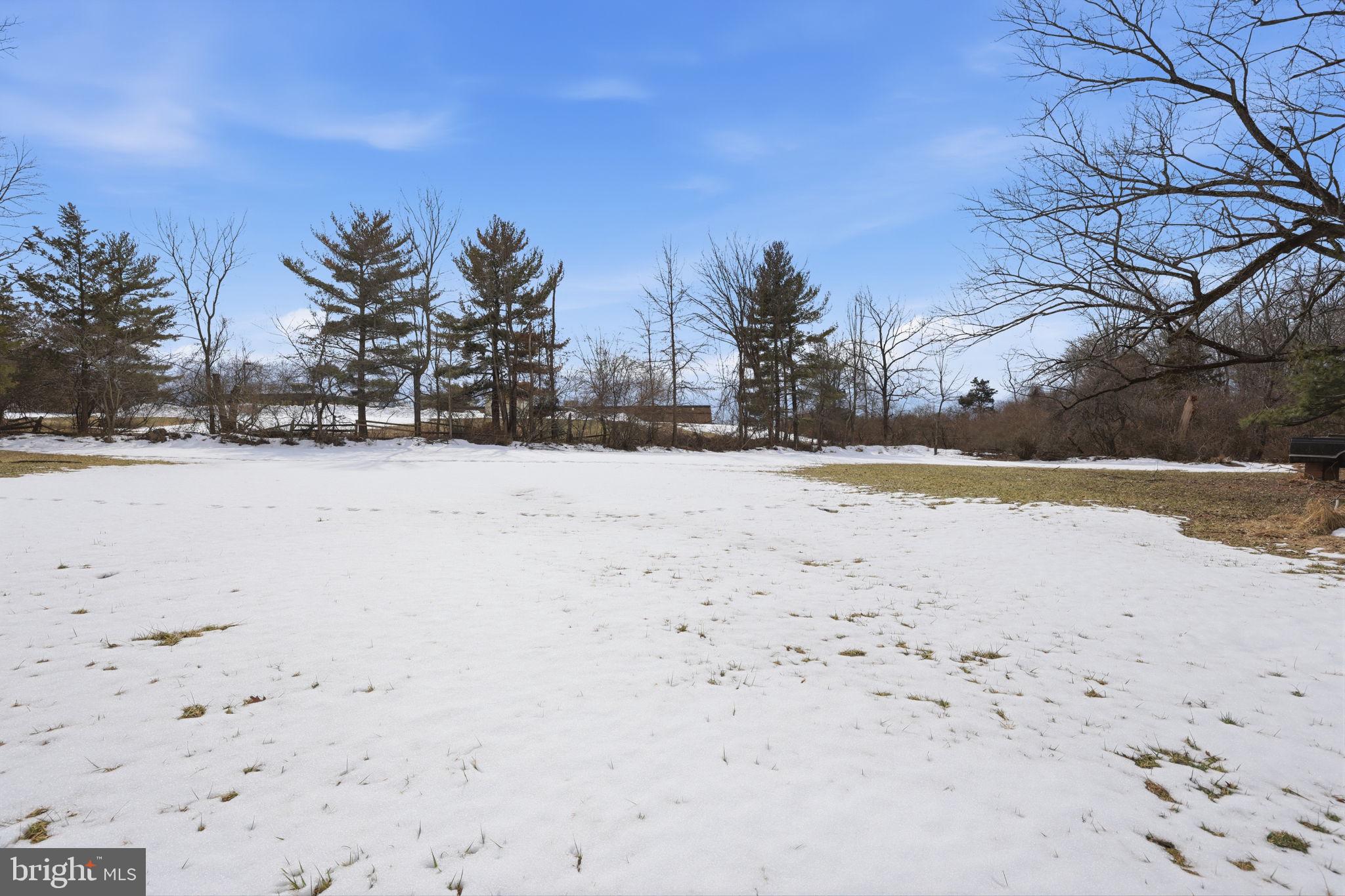 186 Pennington - Harbourton Road Pennington, NJ 08534 - Photo 11 of 20 a view of a yard covered in snow