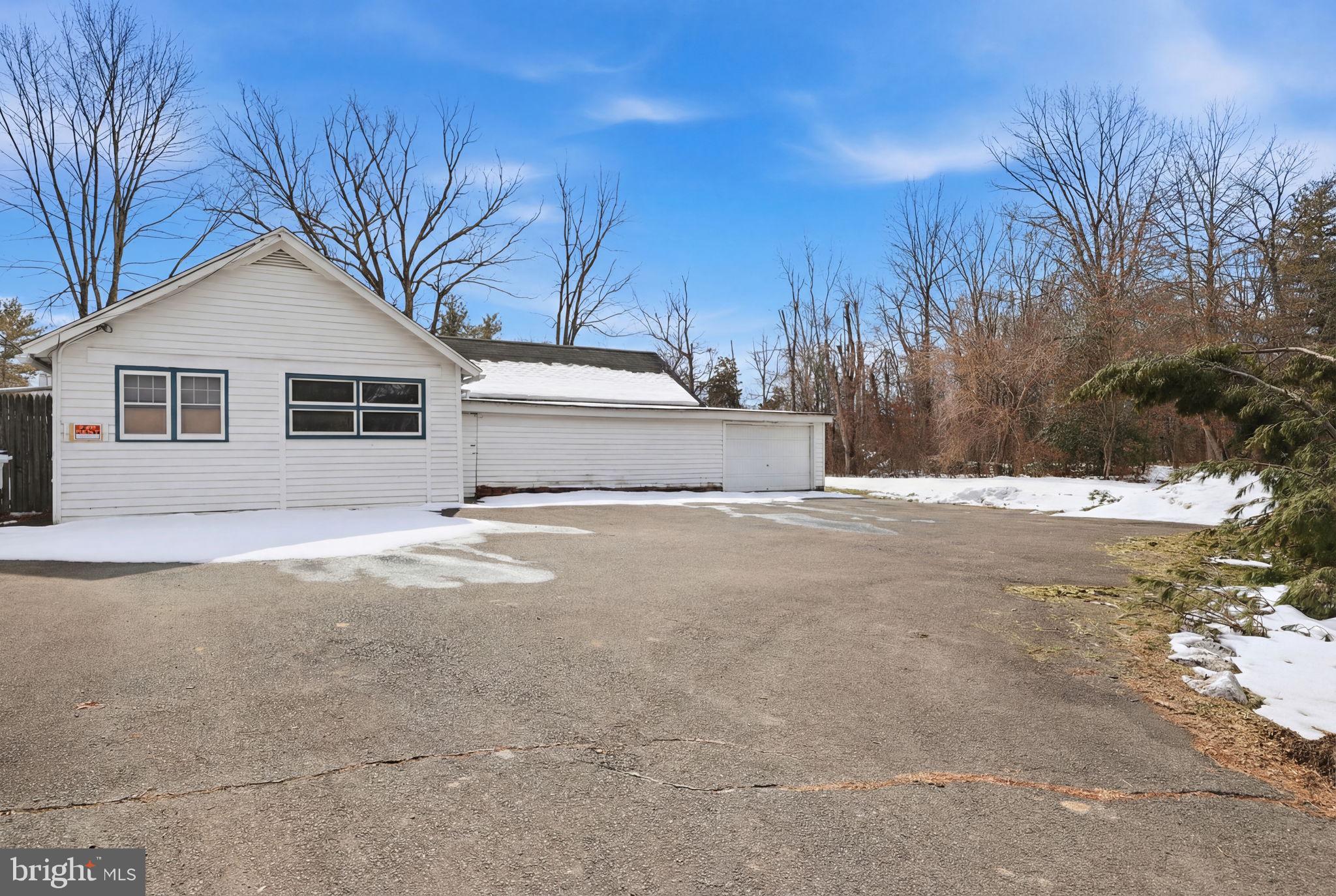 186 Pennington - Harbourton Road Pennington, NJ 08534 - Photo 3 of 20 a view of a house with snow on the road