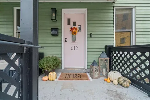 a front view of a house with a window