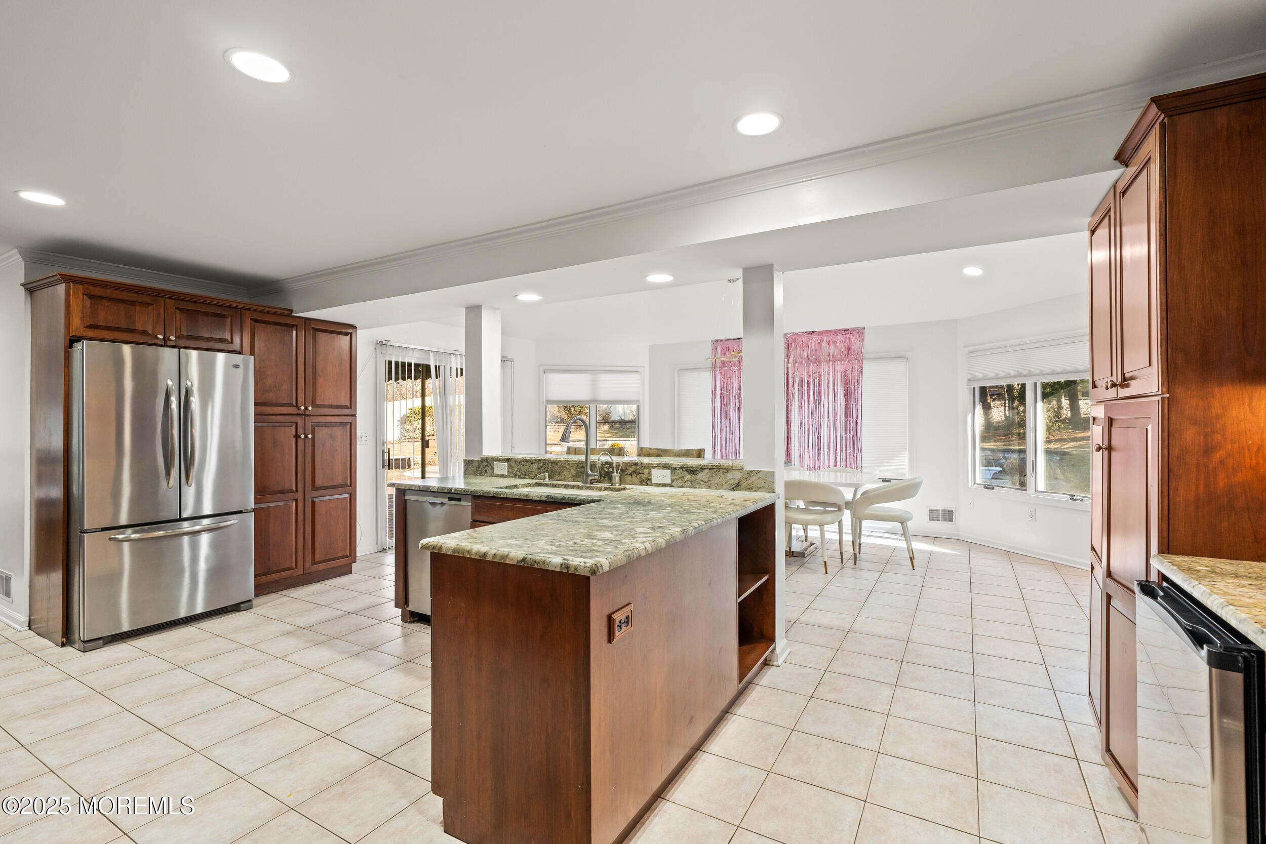 20 Arlene Drive West Long Branch, NJ 07764 - Photo 12 of 32 a kitchen with stainless steel appliances granite countertop a stove and a refrigerator