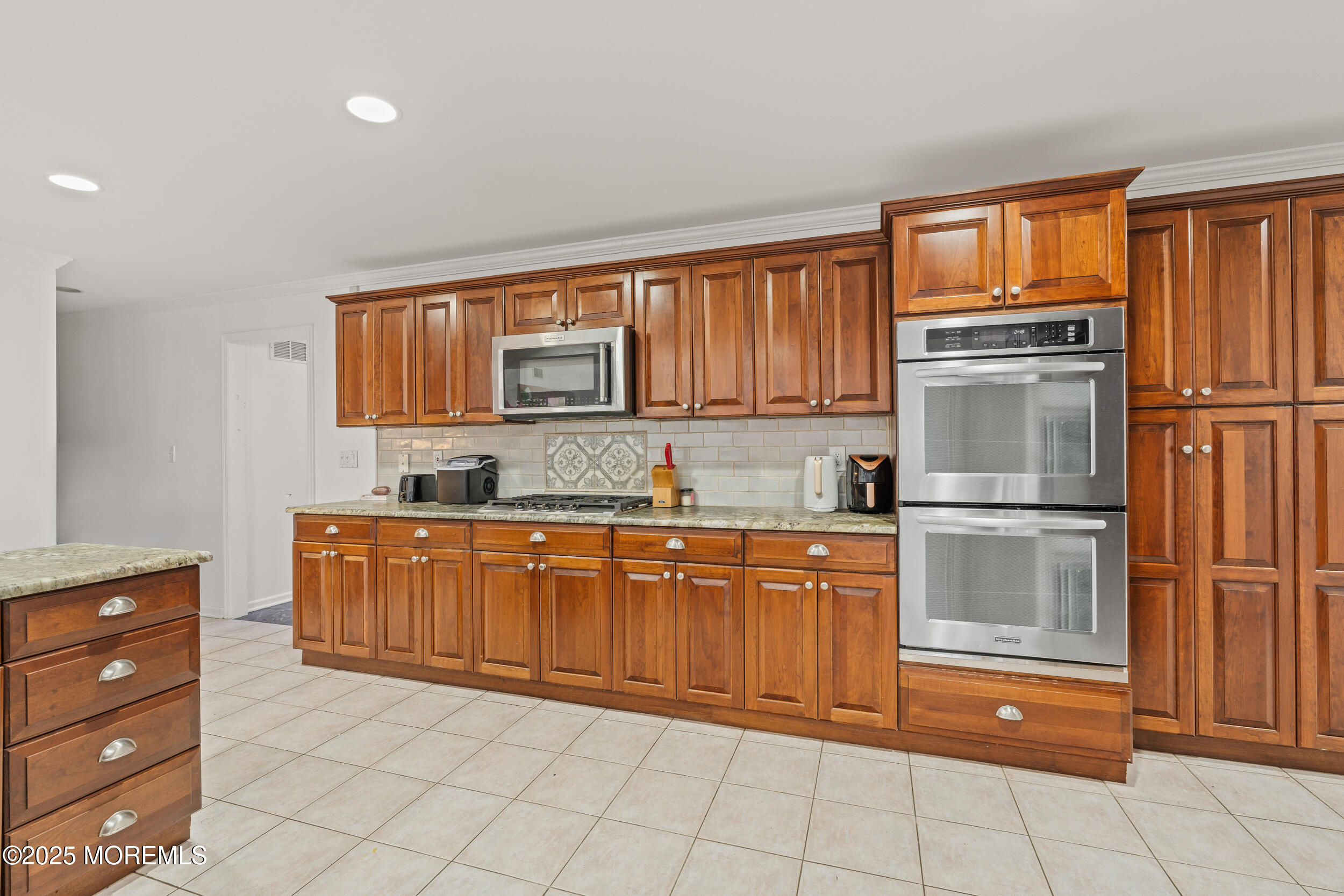 20 Arlene Drive West Long Branch, NJ 07764 - Photo 13 of 32 a kitchen with stainless steel appliances granite countertop a refrigerator and cabinets