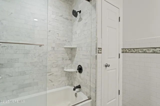 a bathroom with a bathtub