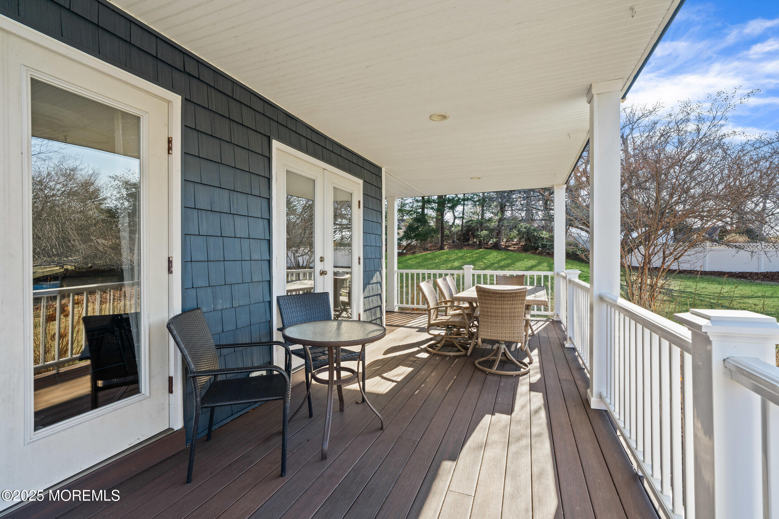 20 Arlene Drive West Long Branch, NJ 07764 - Photo 2 of 32 a view of balcony with chairs and wooden floor