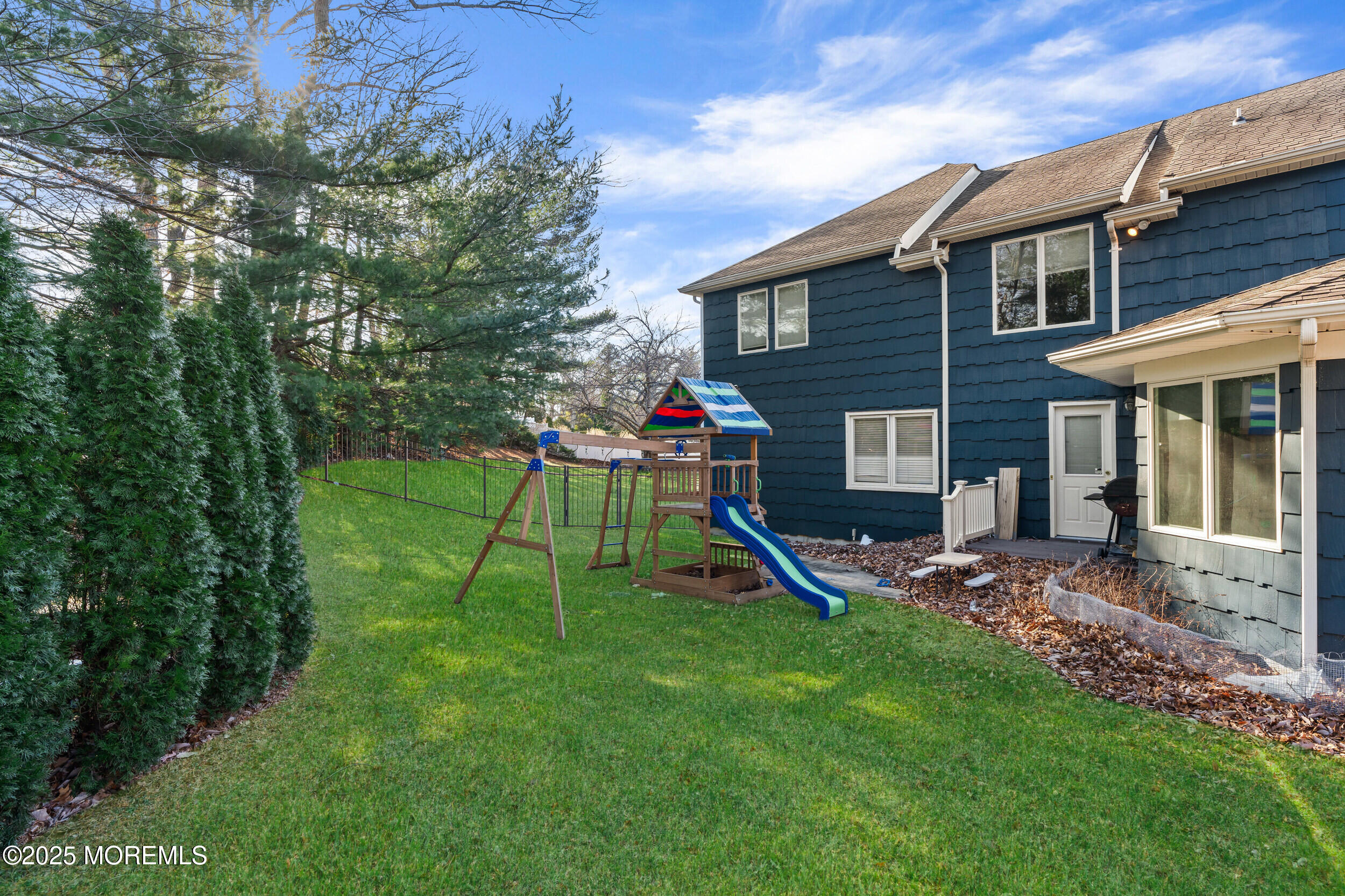 20 Arlene Drive West Long Branch, NJ 07764 - Photo 32 of 32 a view of a house with a backyard and a slide