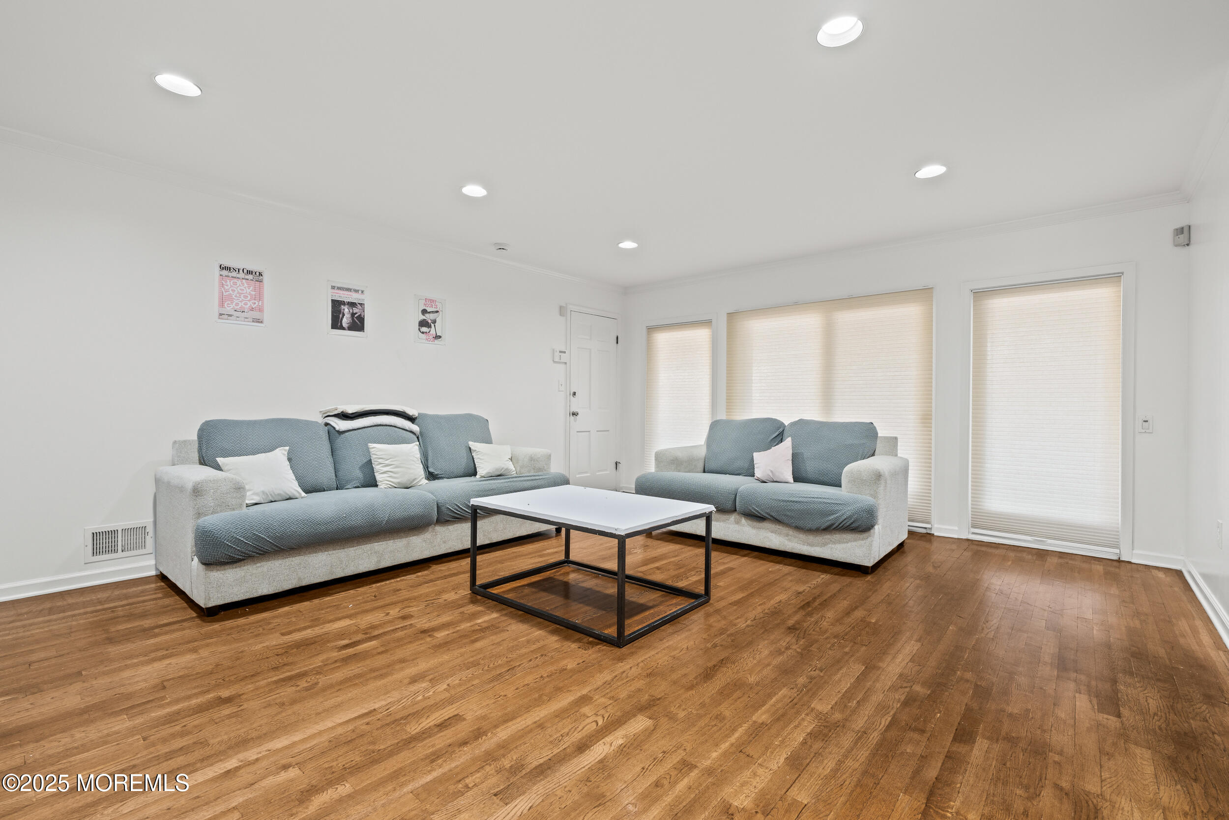 20 Arlene Drive West Long Branch, NJ 07764 - Photo 10 of 32 a living room with furniture and a wooden floor